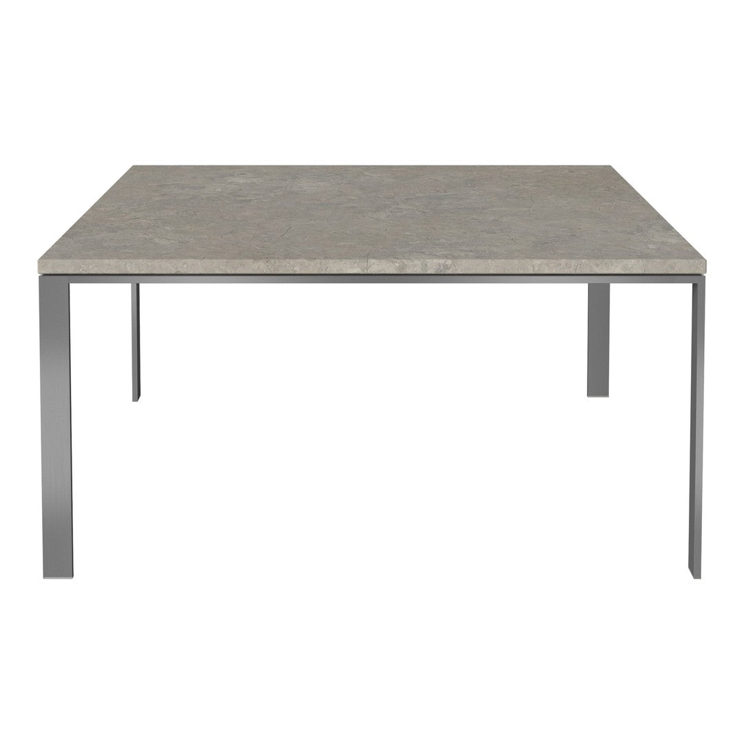 Gray concrete top table with sleek metallic legs, featuring a minimalist design and smooth texture. Ideal for modern decor.