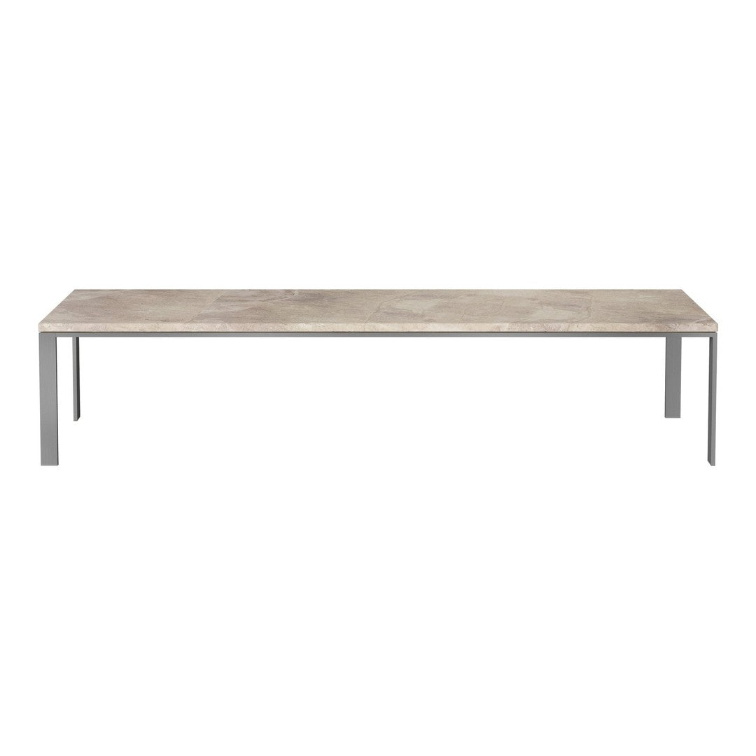 Gray stone tabletop with a smooth finish, supported by sleek silver metal legs. Contemporary modern design.