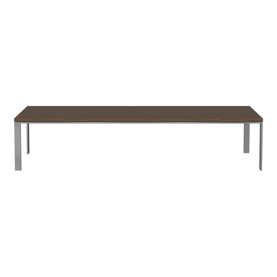 Rectangular table with a sleek dark brown wood finish and chrome legs, featuring a smooth, modern design.