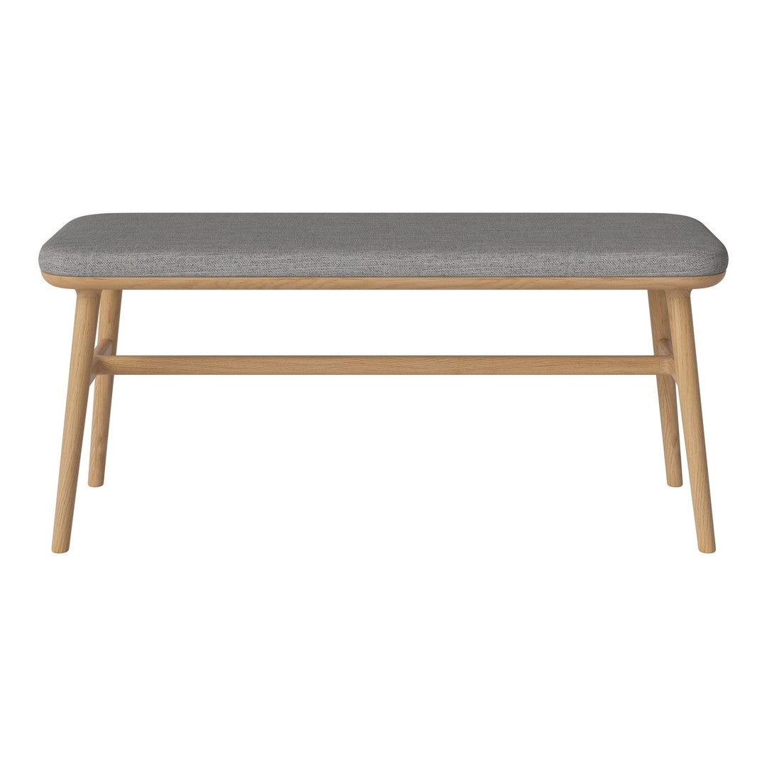 Gray upholstered bench with natural wood legs, featuring a sleek, minimalist design and subtle texture.