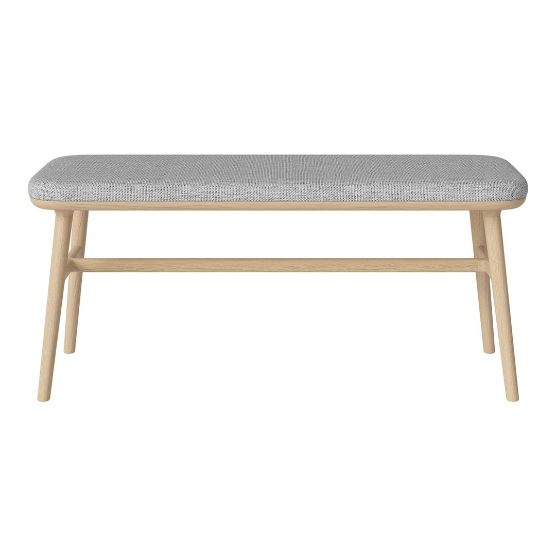Gray upholstered bench with natural wooden legs, featuring a simple, modern design. Ideal for any decor style.