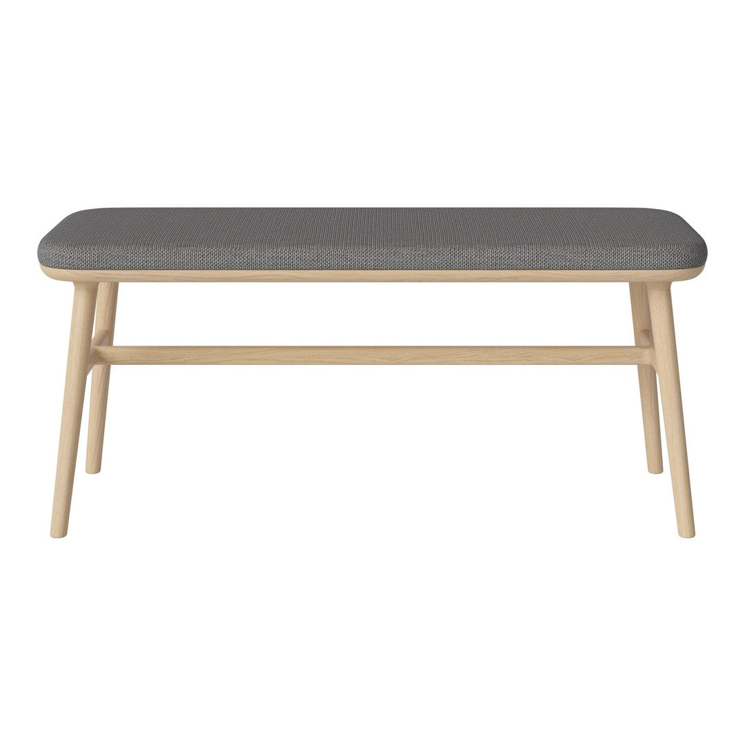 Light wood coffee table with a soft gray upholstered top and clean, simple lines. Perfect for modern decor.