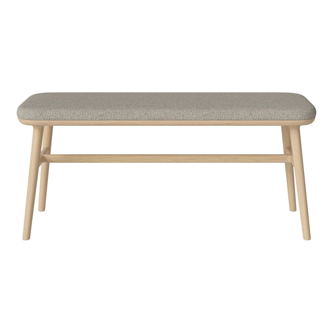 Light wooden coffee table with a soft gray upholstered top and minimalist design, ideal for modern interiors.