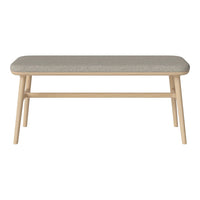 Light wooden coffee table with a soft gray upholstered top and minimalist design, ideal for modern interiors.