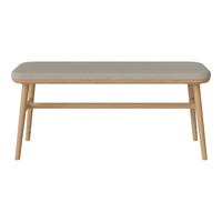 Neutral gray upholstered top with natural wooden legs, featuring a simple, clean design and minimalist aesthetic.