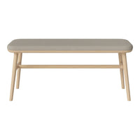 Light gray tabletop with smooth surface, complemented by natural wood legs in a minimalist design. Ideal for modern decor.