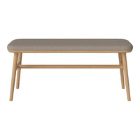 Neutral gray upholstered top with light wood legs, featuring a simple, modern design. Perfect for any decor.