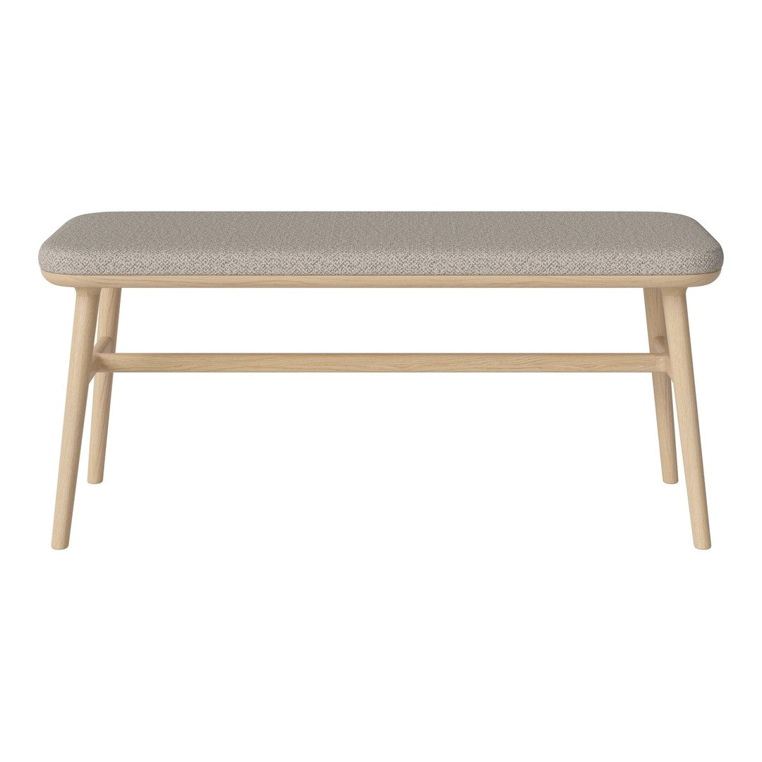 Light wood bench with a soft, textured gray cushion, featuring a minimalist design and subtle patterns.