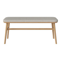 Light gray upholstered bench with a natural wood frame, featuring a smooth, minimalist design. Ideal for modern decor.