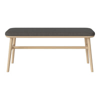 Gray tabletop with a smooth finish, complemented by natural wood legs in a light beige tone. Modern minimalist design.