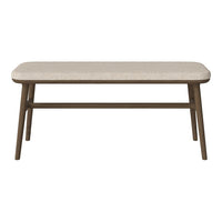 Beige patterned tabletop with brown wooden legs, showcasing a modern and minimalist design. Perfect for contemporary interiors.