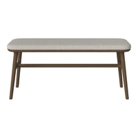 Beige upholstered bench with a textured pattern and brown wooden legs. Modern, minimalist design for any space.
