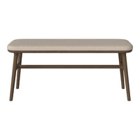 Light beige rectangular table with a smooth top and natural wood legs, showcasing a minimalist design.