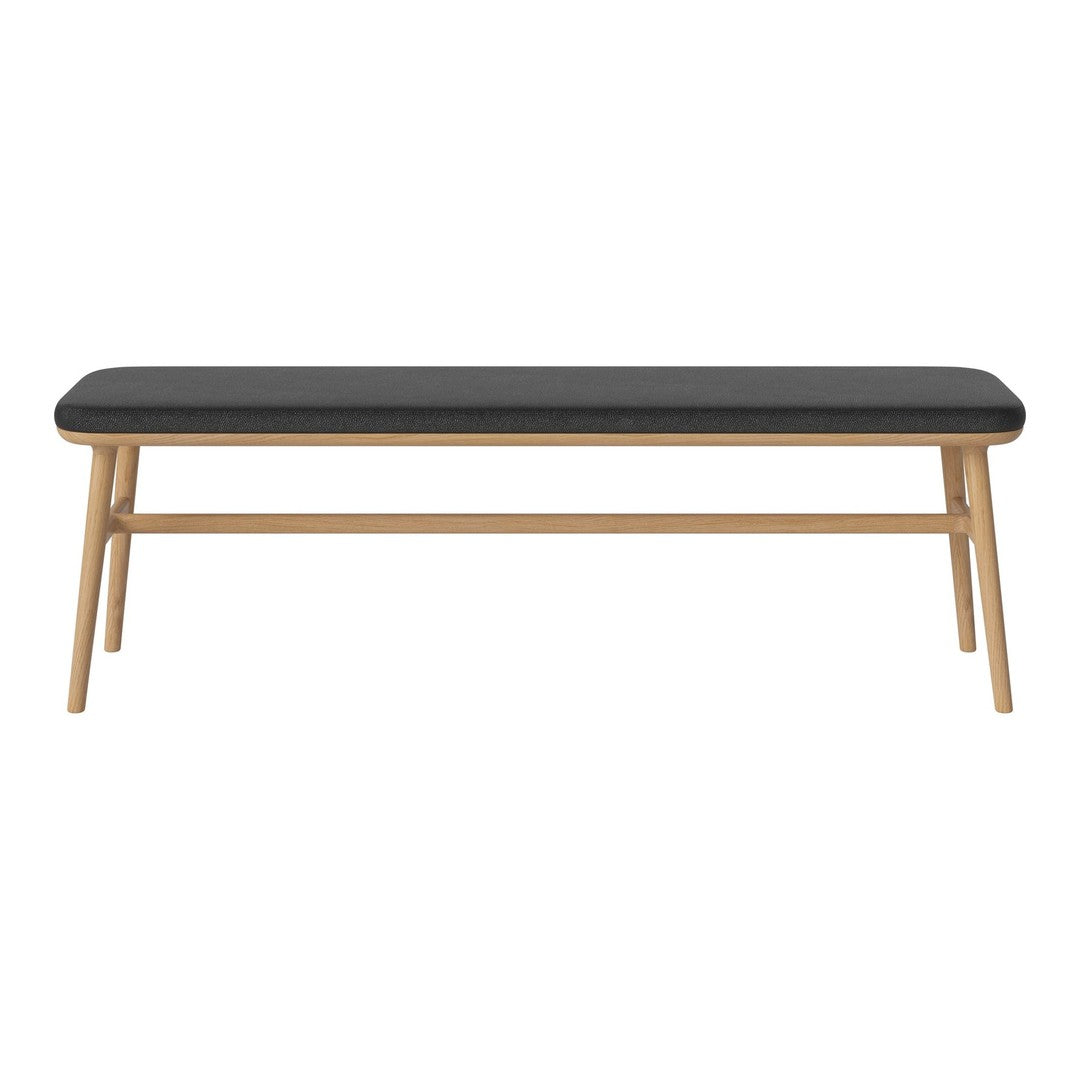 Black upholstered bench with wooden legs, featuring a smooth, minimalist design and a neutral color palette.