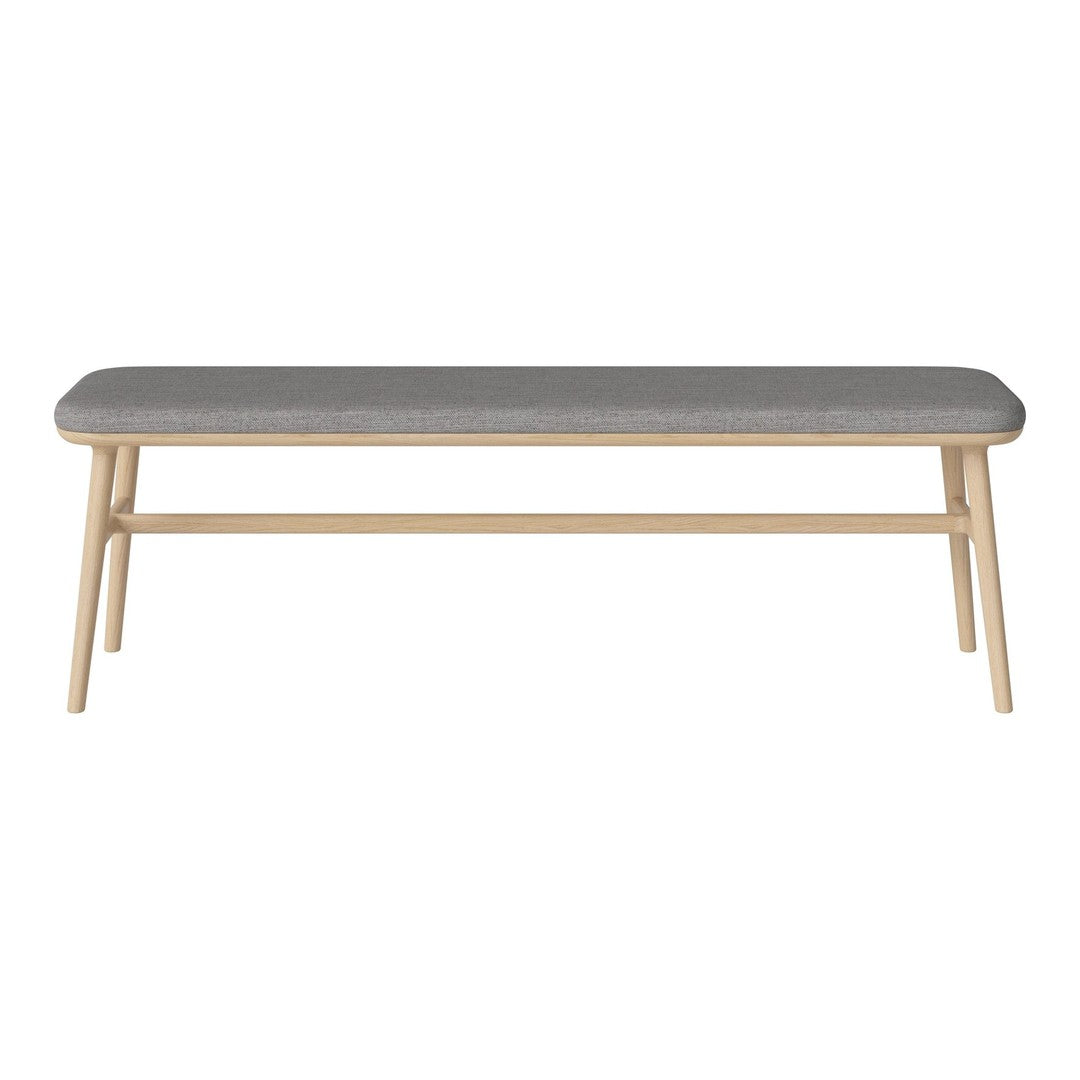 Grey upholstered bench with natural wood legs, featuring a sleek, minimalist design and no visible patterns.