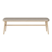 Light beige cushioned bench with natural wood legs, featuring a simple, modern design. Ideal for minimalist decor.