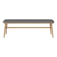 Grey upholstered bench with wooden legs, featuring a sleek, minimalist design and a neutral color palette.