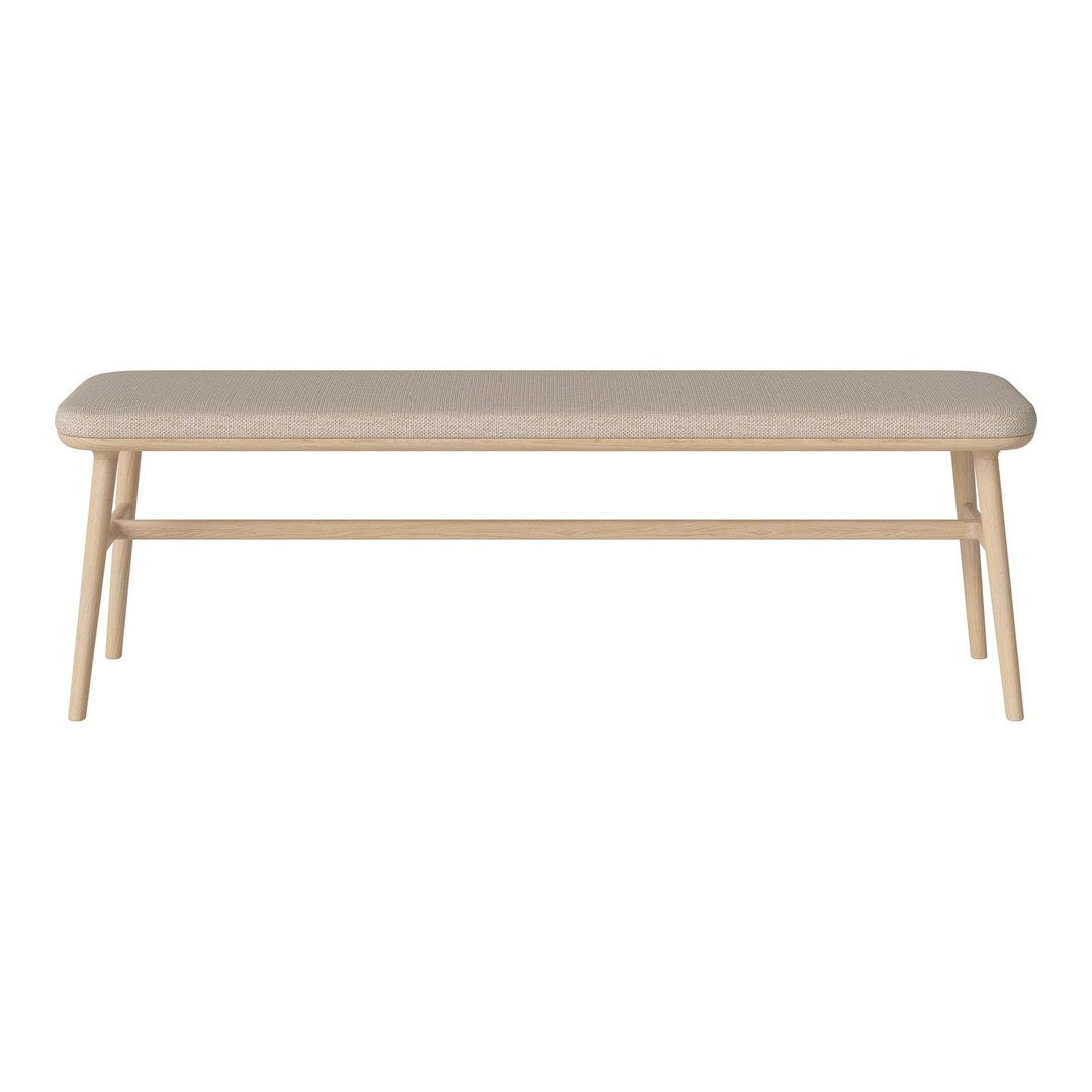 Light beige bench with a smooth, upholstered top and natural wood legs, featuring a minimalist design.