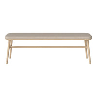 Light beige bench with a smooth, upholstered top and natural wood legs, featuring a minimalist design.