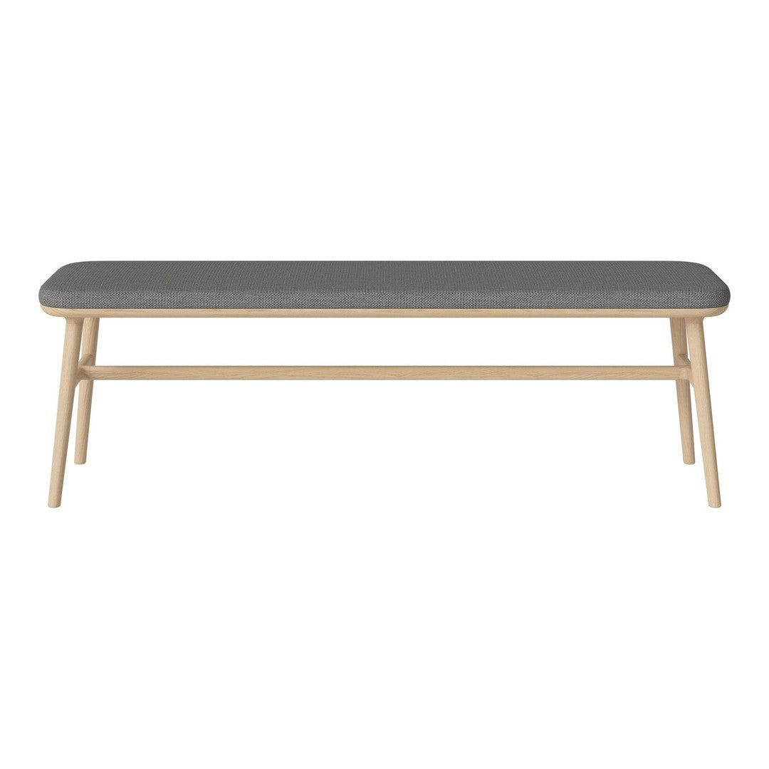 Grey upholstered bench with natural wood legs, featuring a sleek, minimalist design and smooth, contemporary lines.