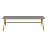 Gray upholstered bench with natural wood legs, featuring a sleek, minimalist design. Perfect for modern decor.