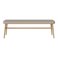 Light beige upholstered bench with natural wood legs, featuring a minimalist design and clean lines.
