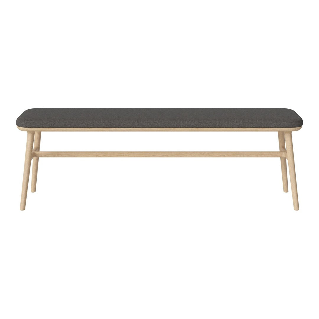 Modern coffee table with a dark gray top and natural wood legs, featuring a sleek, minimalist design.