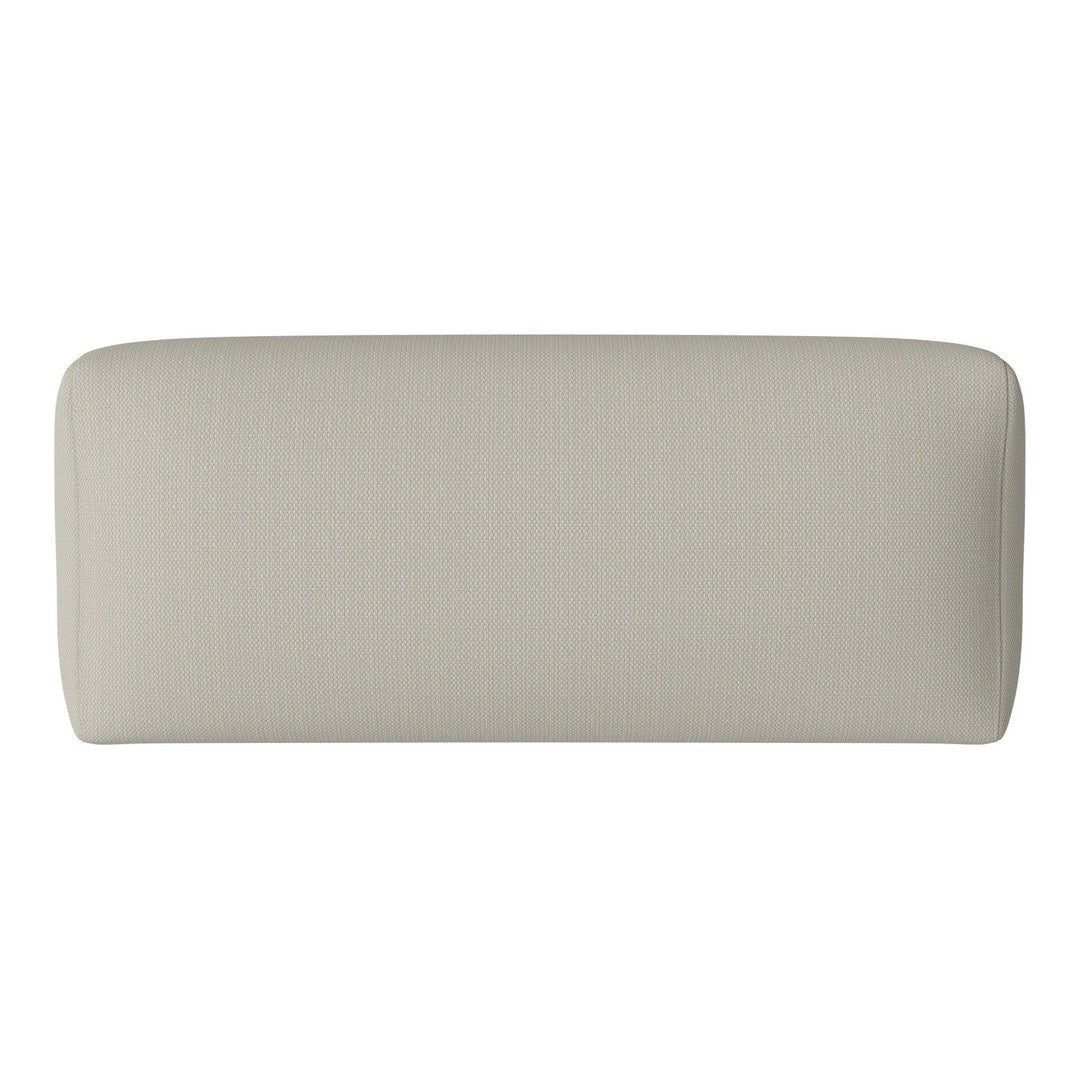 Beige upholstered headboard with subtle vertical ribbing pattern, adding texture and sophistication to bedroom decor.