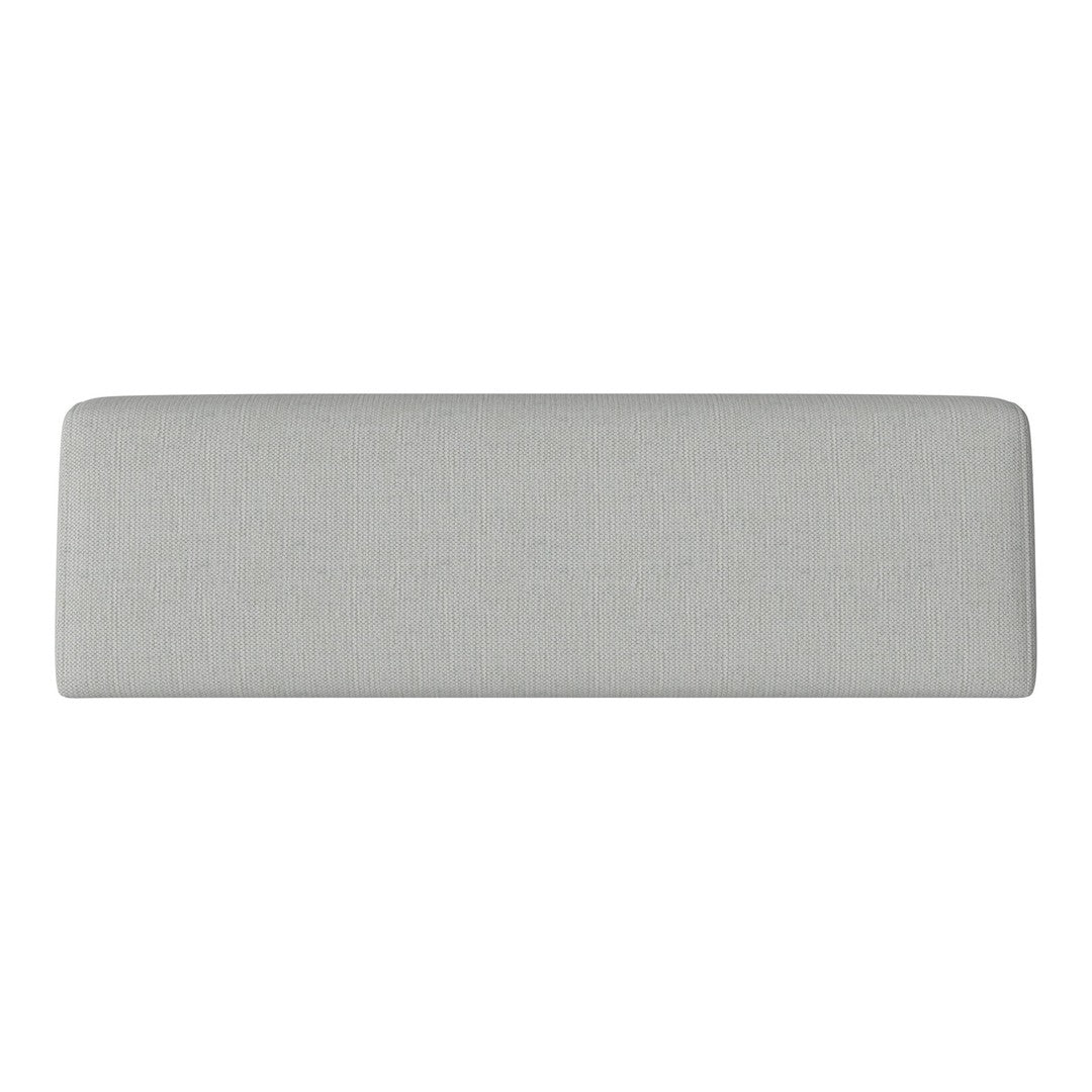Gray upholstered long rectangular headboard with a smooth, minimalistic design. Ideal for modern bedroom decor.