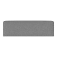 Gray upholstered headboard with a smooth, textured finish, adding a modern touch to any bedroom decor.