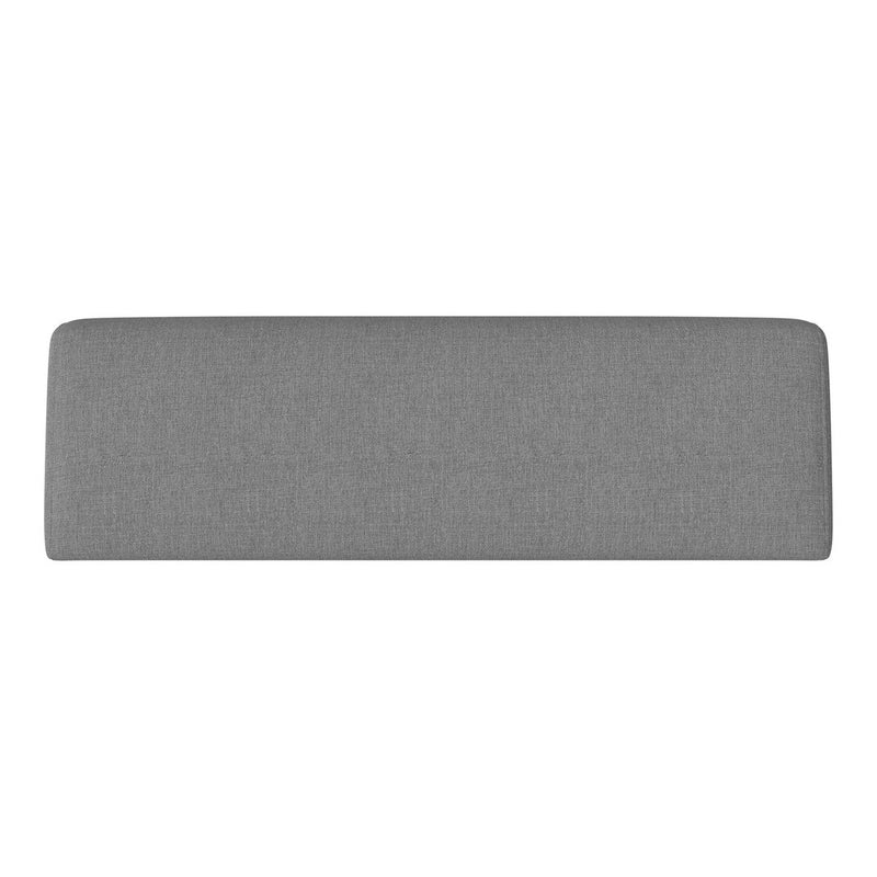 Gray upholstered headboard with a smooth, textured finish, adding a modern touch to any bedroom decor.
