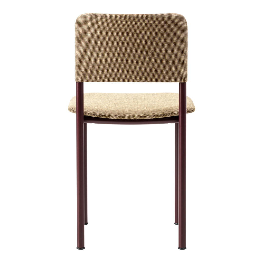 Brown upholstered chair with a tan fabric seat and maroon metal legs. Simple, modern design with neutral tones.