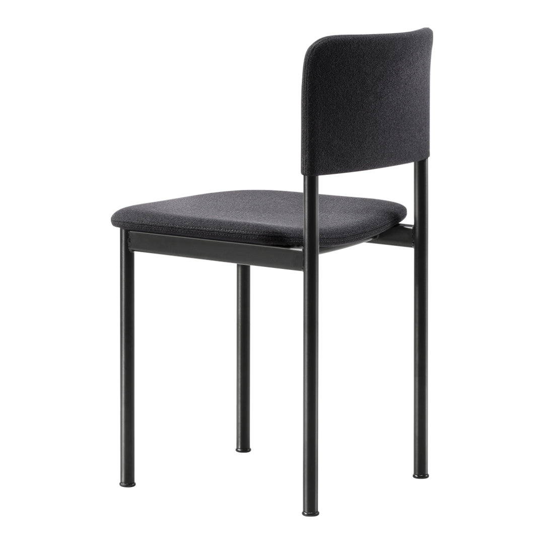 Black upholstered chair with a minimalist design and sleek metal frame. Simple and modern style for any space.