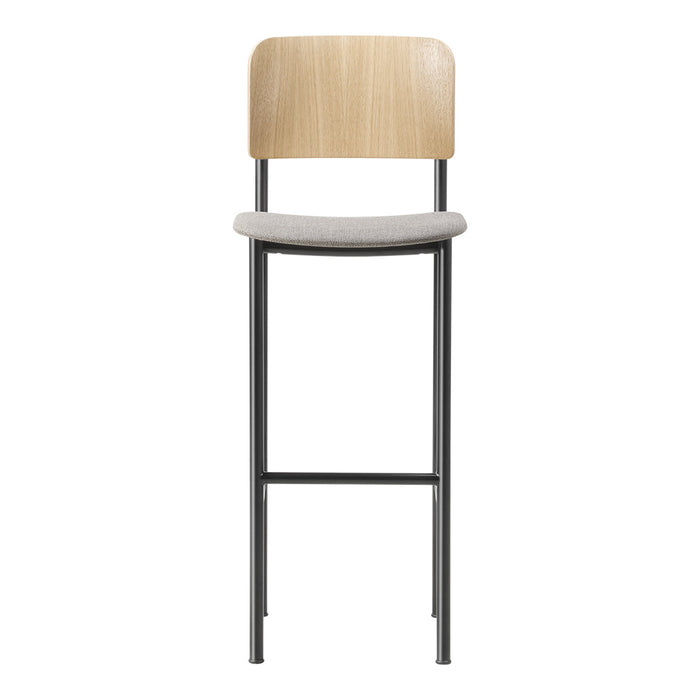 Wooden backrest and light gray upholstered seat on a sleek black metal frame bar stool. Modern and minimalist design.