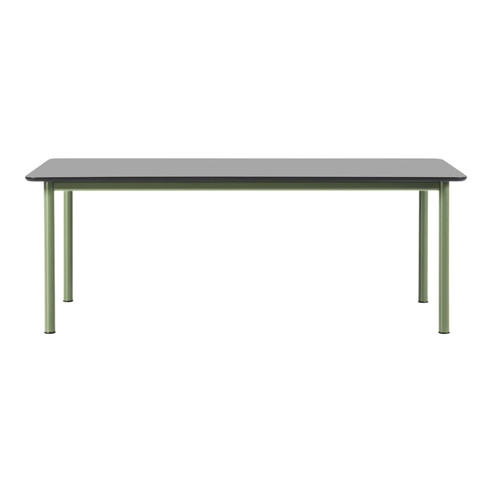 Gray tabletop with contrasting green metal legs, featuring a sleek and modern design perfect for contemporary spaces.