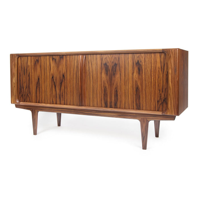 Mid-century modern cabinet featuring rich walnut wood with striking grain patterns and tapered legs.
