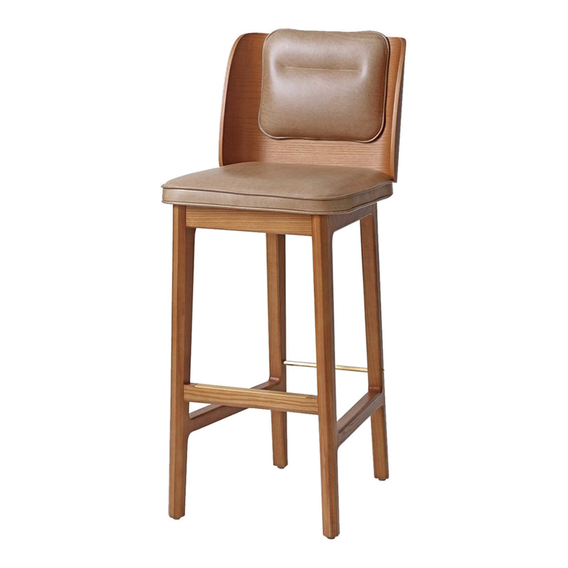 Tan leather upholstered bar stool with a warm wood frame and smooth, minimalist design. Perfect for modern decor.
