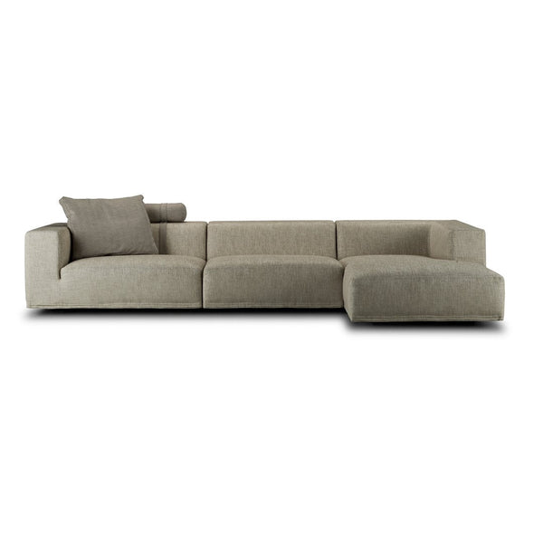 Light gray sectional sofa with a smooth fabric texture and minimalist design. Includes a matching decorative pillow.