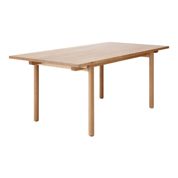 Light oak dining table with a smooth, natural wood finish and simple, modern design. Perfect for any dining space.