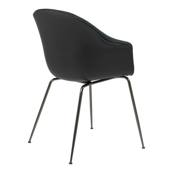 Black upholstered chair with sleek, curved design and metal legs, showcasing a modern, minimalist aesthetic.