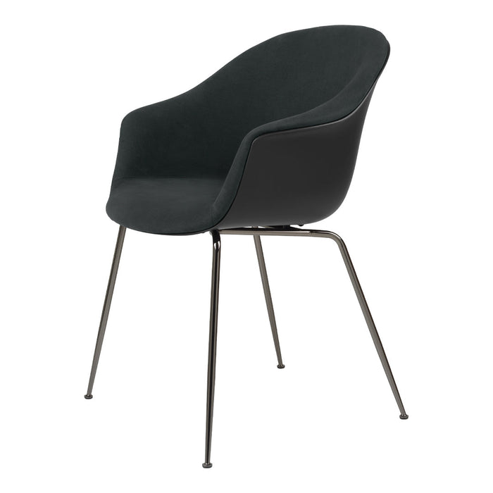 Black upholstered chair with smooth curves and sleek metal legs, perfect for modern interiors.