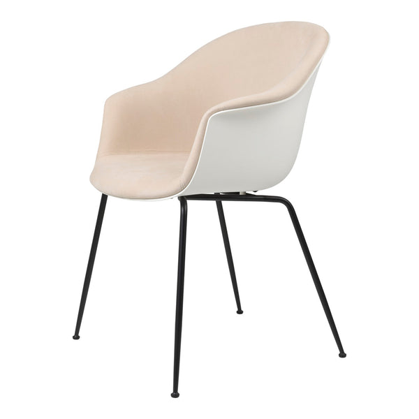Stylish beige and white chair with sleek black legs; smooth, modern design for any decor.