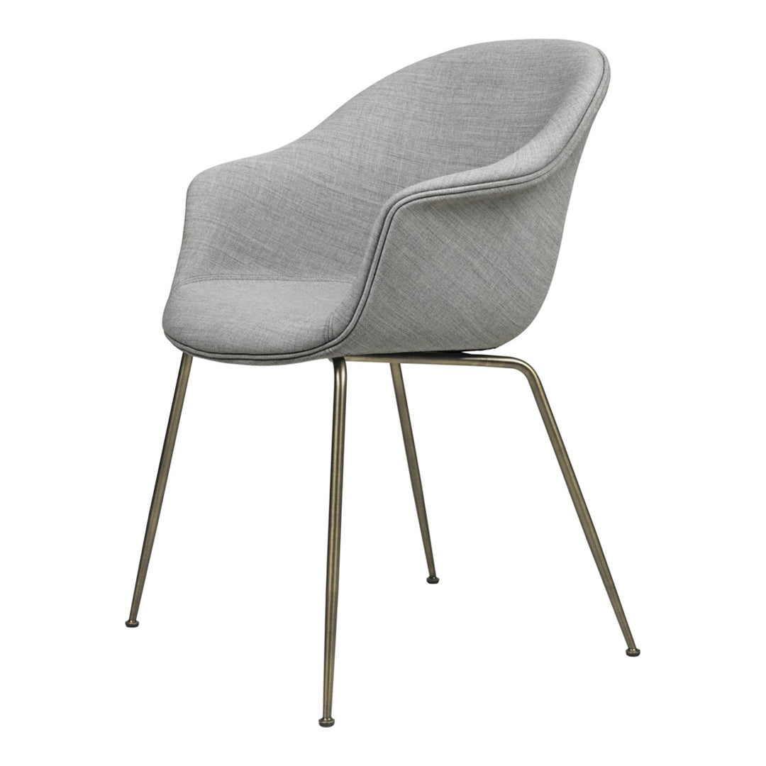 Gray upholstered chair with a sleek design and smooth texture, featuring metallic gold legs for a modern touch.