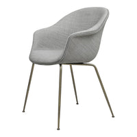 Gray upholstered chair with a sleek design and smooth texture, featuring metallic gold legs for a modern touch.