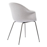 Light gray upholstered chair with a textured finish and sleek metal legs. Elegant and modern design.
