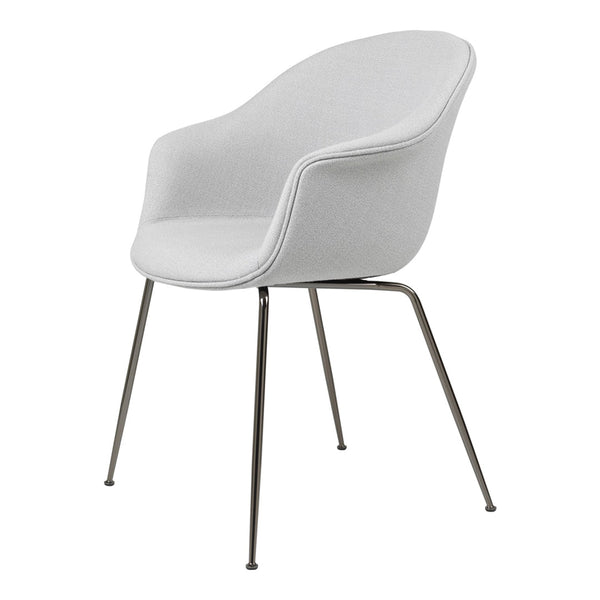 Modern white upholstered chair with sleek gray legs, showcasing a minimalist design and smooth contours.