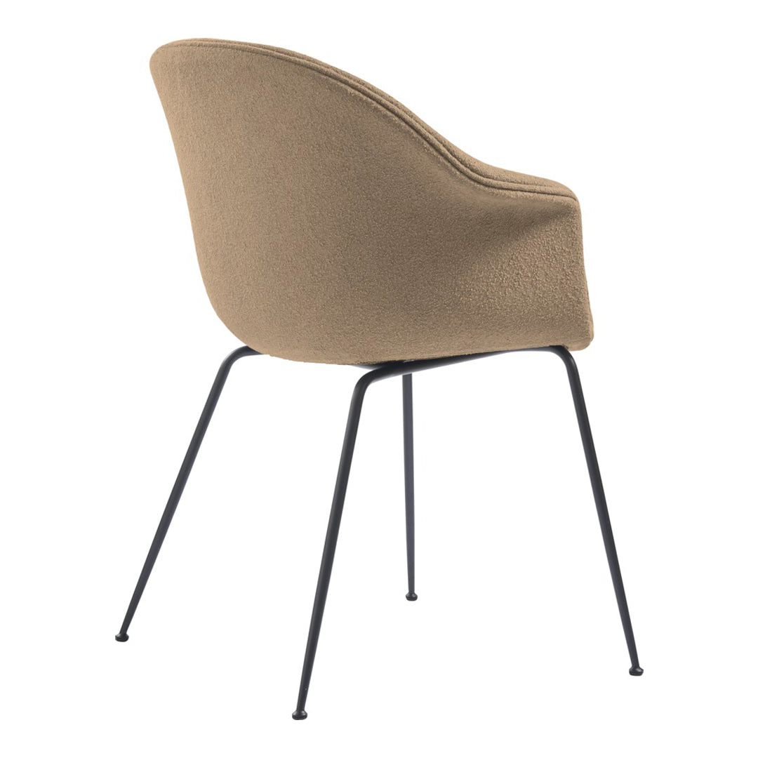 Tan upholstered chair with a smooth, curved back and black metal legs, showcasing a minimalist design.