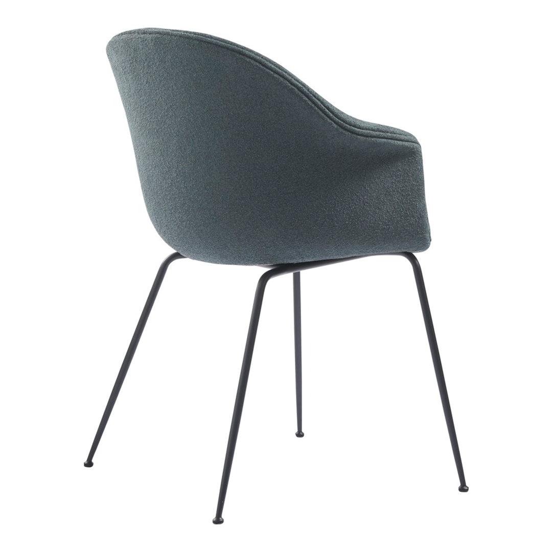 Stylish gray upholstered chair with a smooth texture and sleek black metal legs for a modern look.