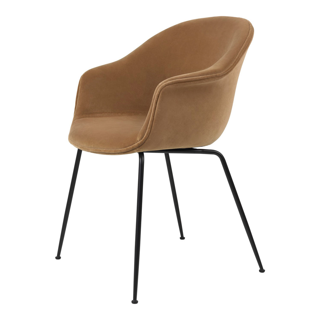 Brown velvet armchair with black metal legs, featuring a smooth, modern design. Ideal for stylish home decor.