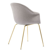 Light gray upholstered chair with smooth curves and gold metal legs, perfect for modern decor.